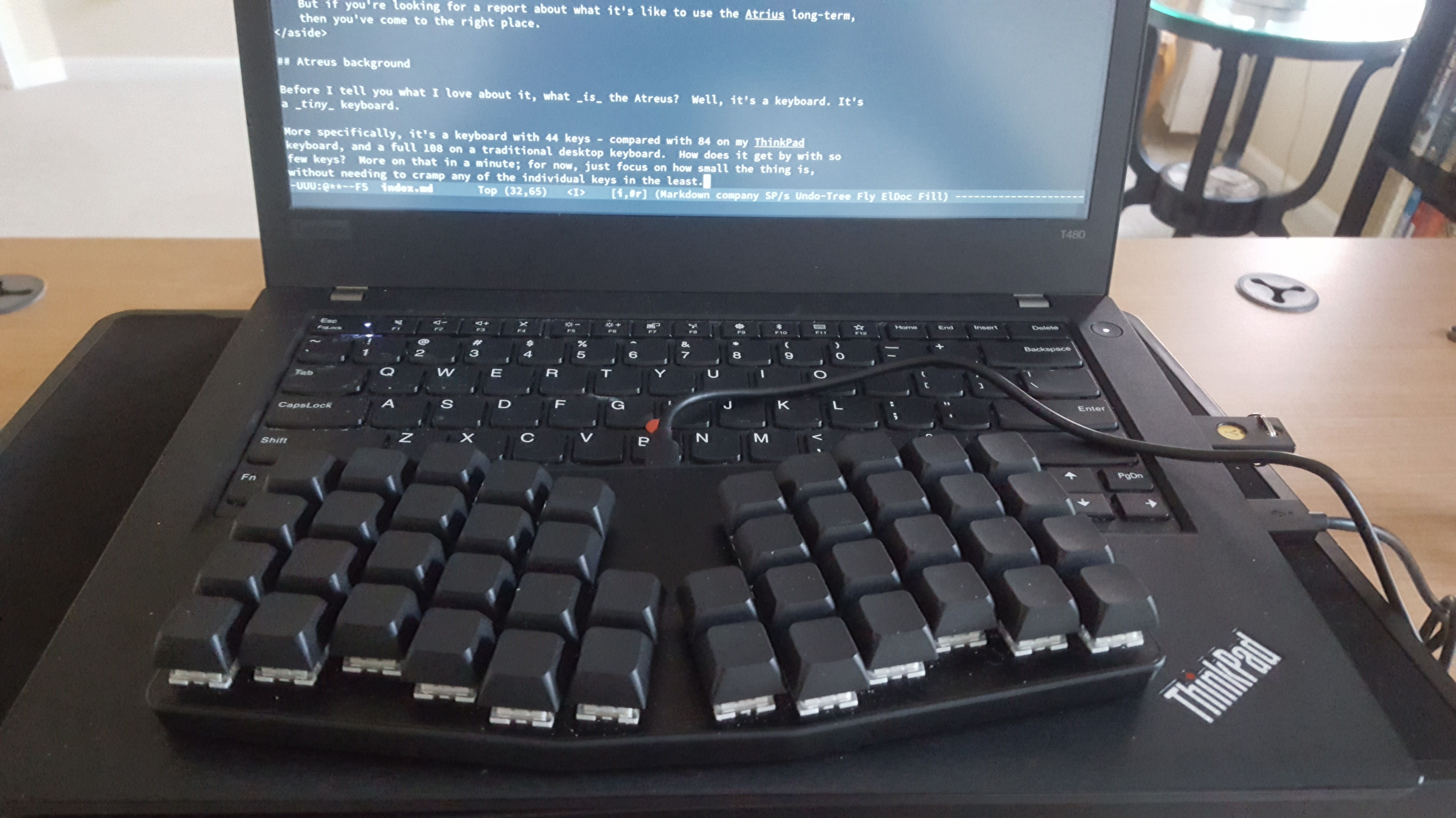 The Atreus keyboard on top of a ThinkPad